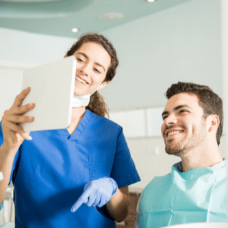 dental hygienist and patient
